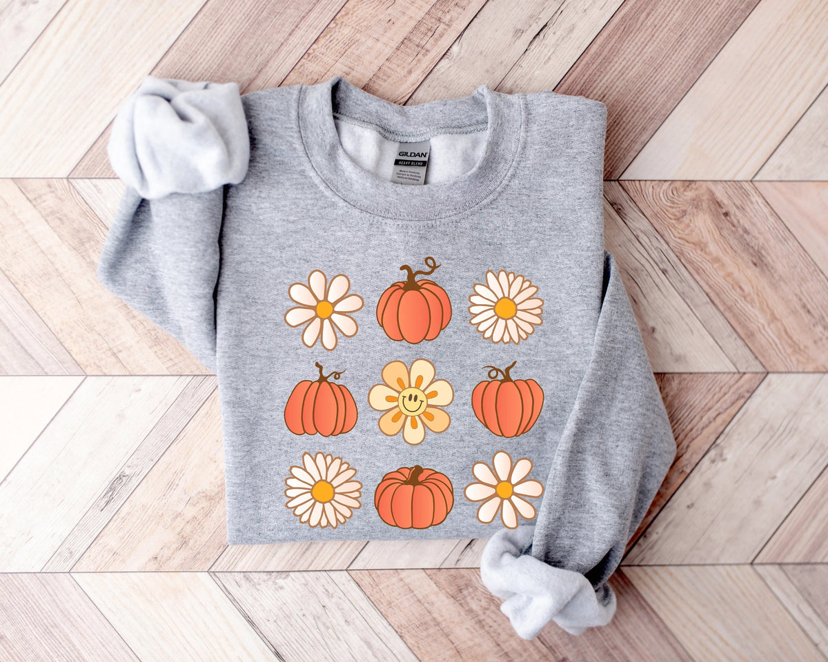 Süßes bequemes Rundhals-Sweatshirt mit Blumen und Kürbissen